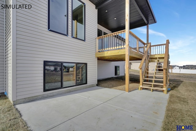 exterior space featuring stairs and a wooden deck