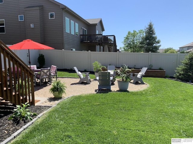 view of yard with a patio and fence