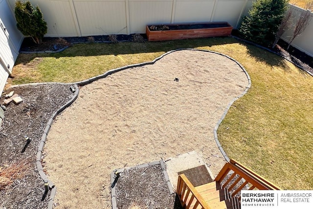 view of yard featuring a fenced backyard