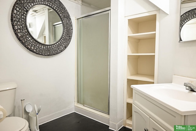 bathroom featuring toilet, wood finished floors, a shower stall, baseboards, and vanity