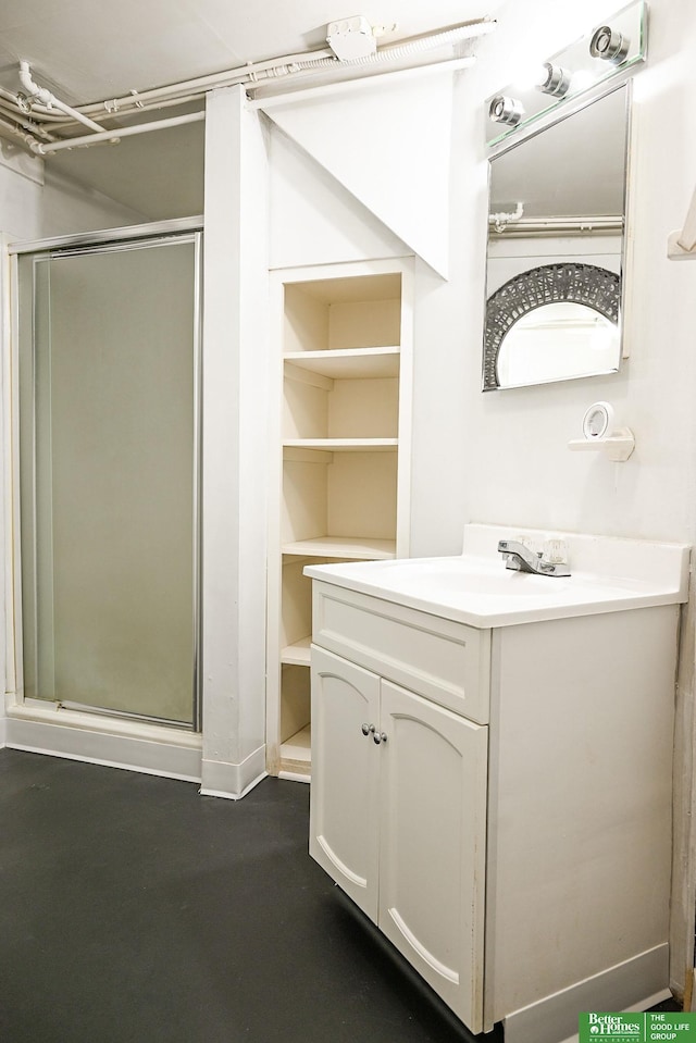 bathroom featuring vanity and a stall shower