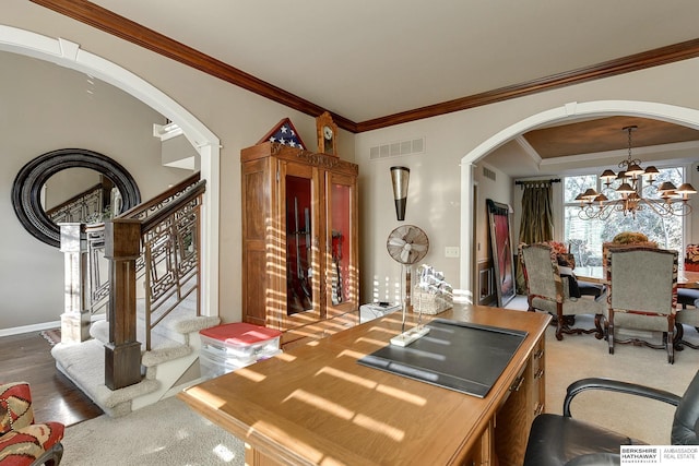 interior space featuring visible vents, stairway, ornamental molding, arched walkways, and a notable chandelier