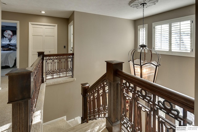 stairs featuring carpet flooring, recessed lighting, and baseboards