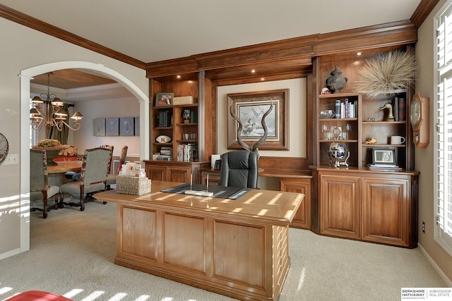 office space with visible vents, arched walkways, light colored carpet, and ornamental molding