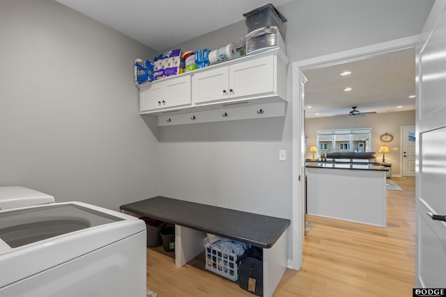 mudroom featuring a ceiling fan, light wood-style flooring, recessed lighting, and washing machine and dryer