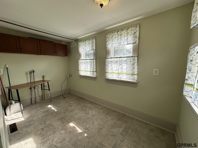 interior space with baseboards