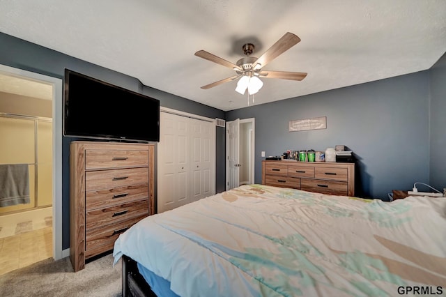 bedroom featuring a ceiling fan and light colored carpet