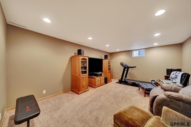 living room featuring recessed lighting, light colored carpet, and baseboards