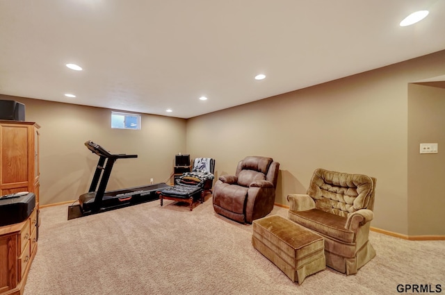 living area with recessed lighting, baseboards, and light carpet