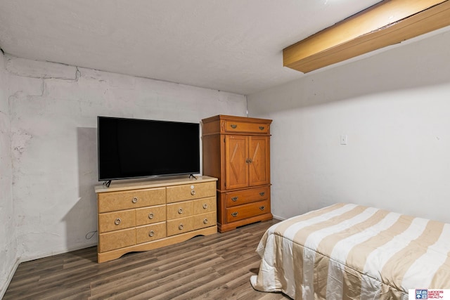 bedroom with wood finished floors