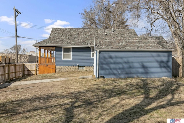 garage featuring fence