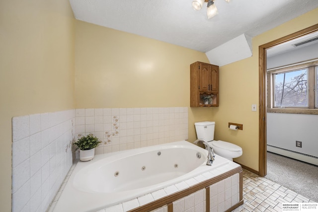 full bathroom with visible vents, a textured ceiling, a baseboard heating unit, a jetted tub, and toilet