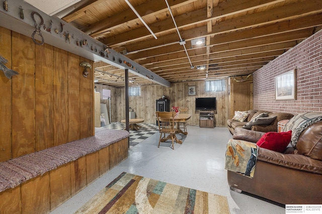 interior space with brick wall and wood walls