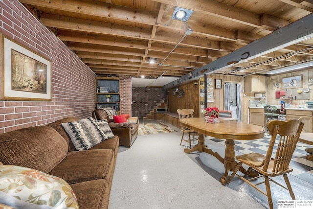 interior space with stairway and brick wall