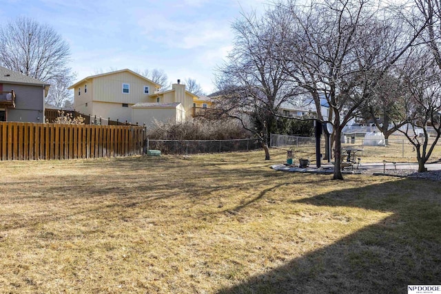 view of yard featuring fence