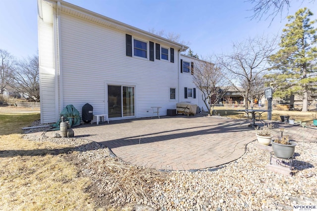 rear view of house with a patio