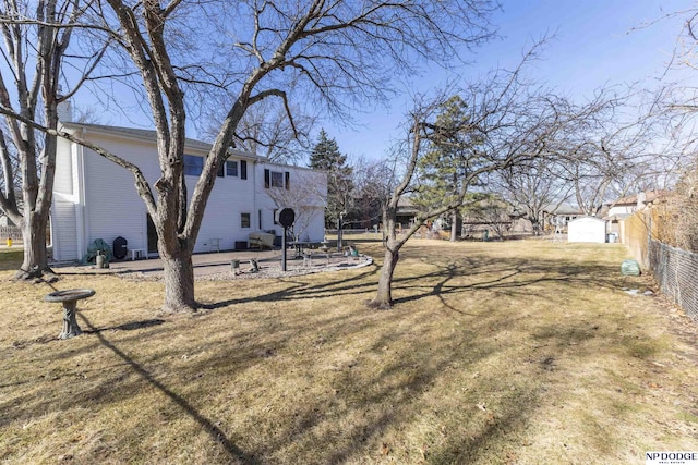 view of yard with a patio and fence