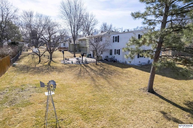 view of yard featuring a patio area and fence