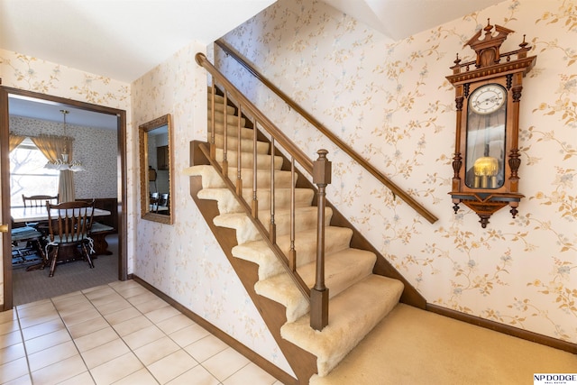 stairway featuring wallpapered walls, baseboards, and tile patterned flooring