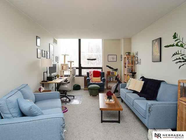 living area with visible vents and carpet floors