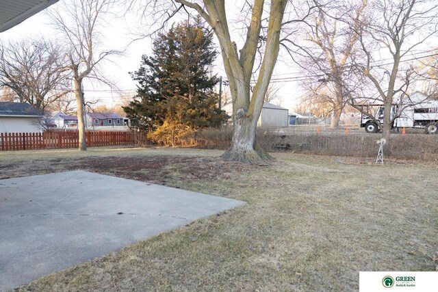 view of yard with a patio area and fence