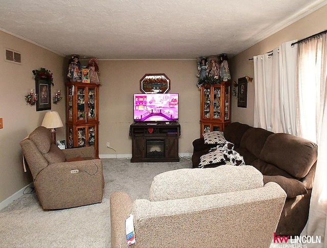 carpeted living area with visible vents, a fireplace, a textured ceiling, and baseboards