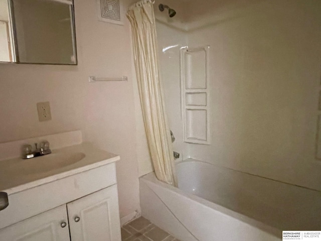 full bathroom with vanity and shower / bath combo