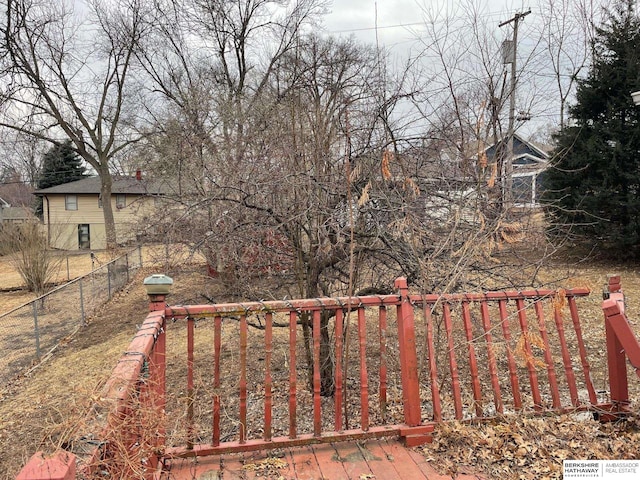 view of gate with fence