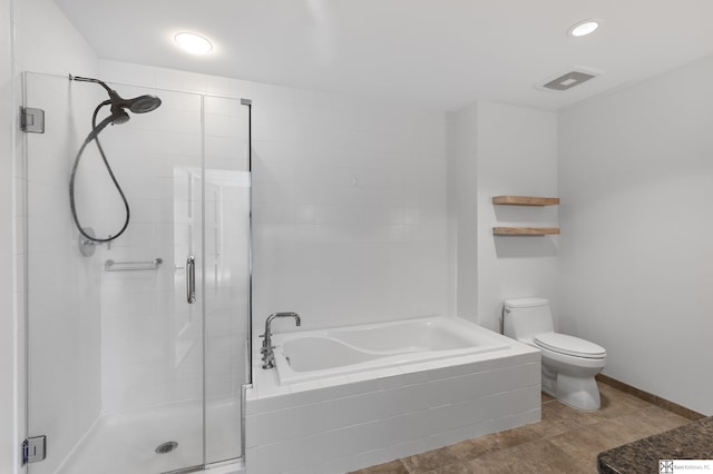 full bathroom featuring visible vents, a shower stall, baseboards, toilet, and a bath