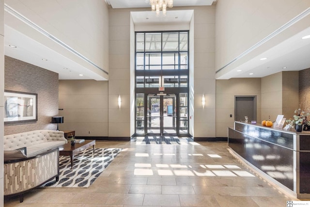 reception area with an inviting chandelier