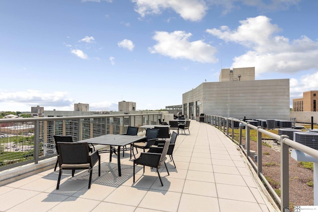 view of patio featuring a balcony