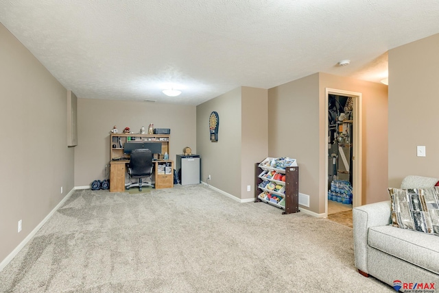 interior space featuring visible vents, baseboards, and a textured ceiling