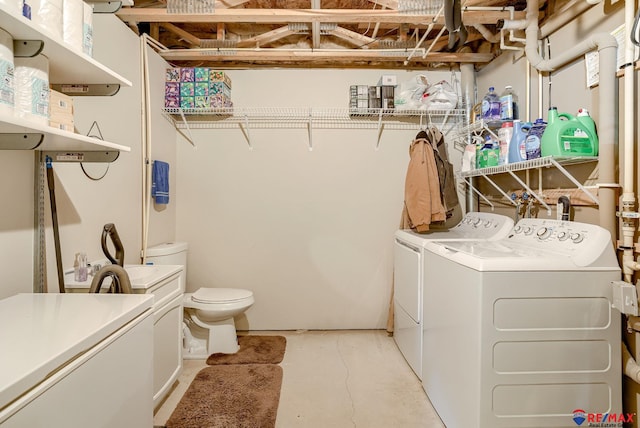 laundry area with laundry area and washing machine and dryer