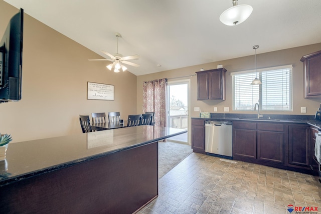 kitchen with a sink, decorative light fixtures, dark brown cabinets, lofted ceiling, and dishwasher