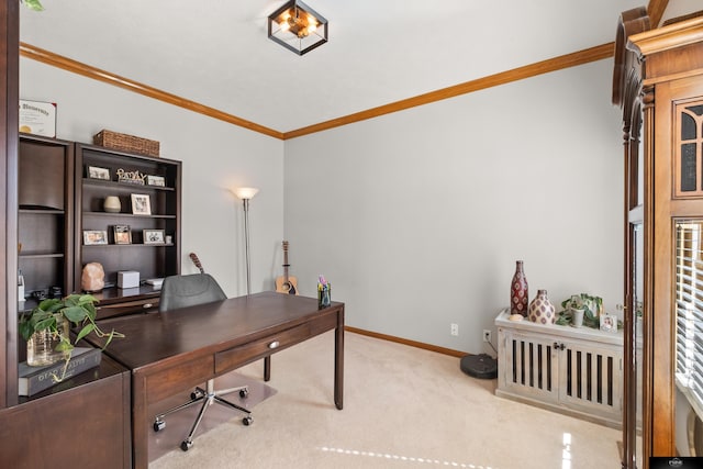 home office featuring carpet flooring, baseboards, and crown molding