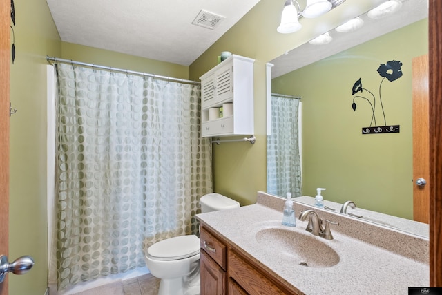 full bathroom featuring visible vents, toilet, a shower with curtain, tile patterned floors, and vanity