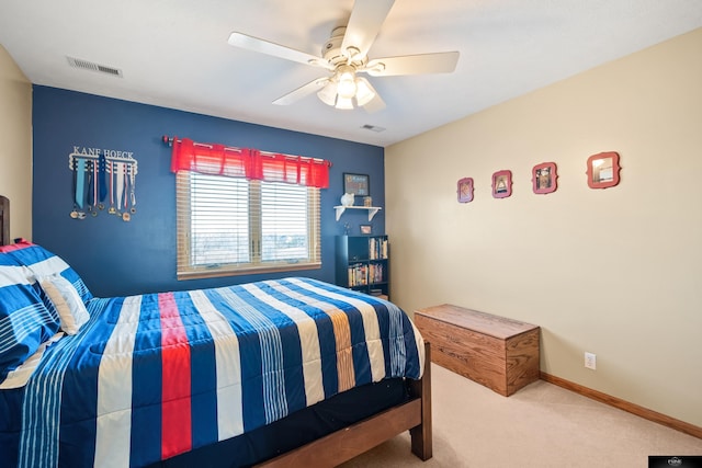 bedroom with baseboards, visible vents, carpet floors, and ceiling fan