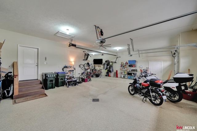 garage featuring a garage door opener