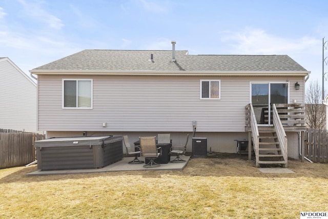 back of house featuring a patio area, fence, and a lawn