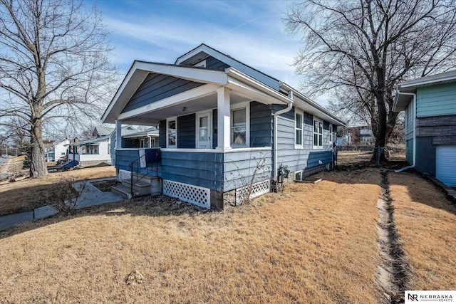 bungalow-style home with covered porch