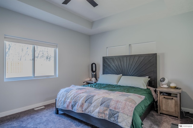 bedroom with visible vents, carpet, baseboards, and ceiling fan