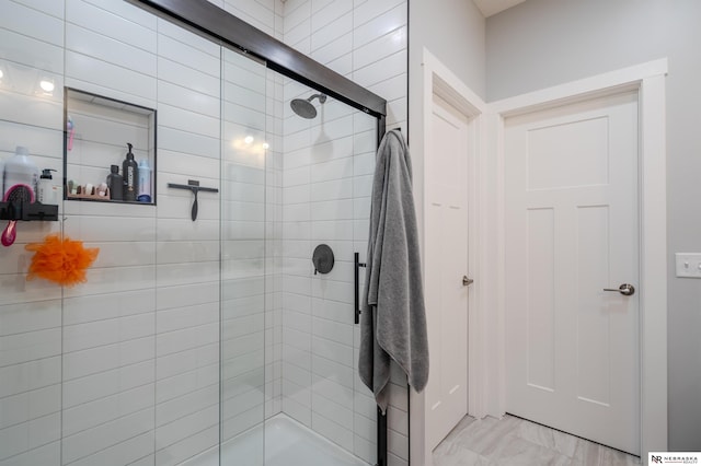 full bathroom with a shower stall