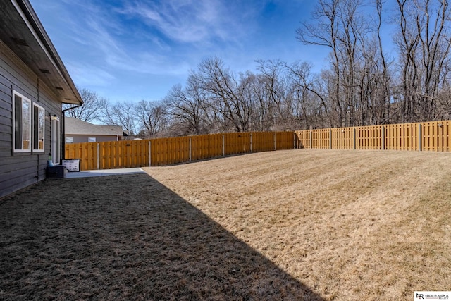 view of yard featuring a fenced backyard