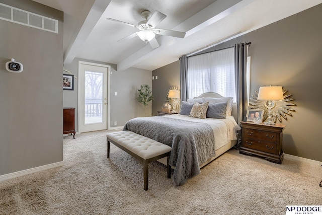 bedroom with lofted ceiling with beams, visible vents, multiple windows, and access to exterior