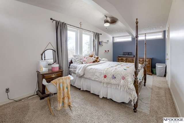 bedroom featuring baseboards, lofted ceiling, carpet floors, and a ceiling fan