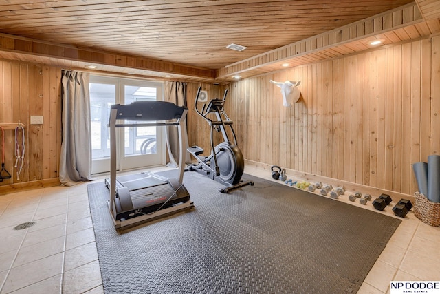 workout area featuring wooden ceiling, tile patterned floors, recessed lighting, and wood walls