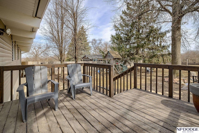 wooden deck with a playground