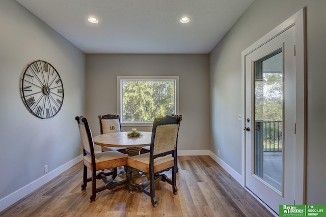 dining room featuring light wood-style flooring, recessed lighting, and baseboards