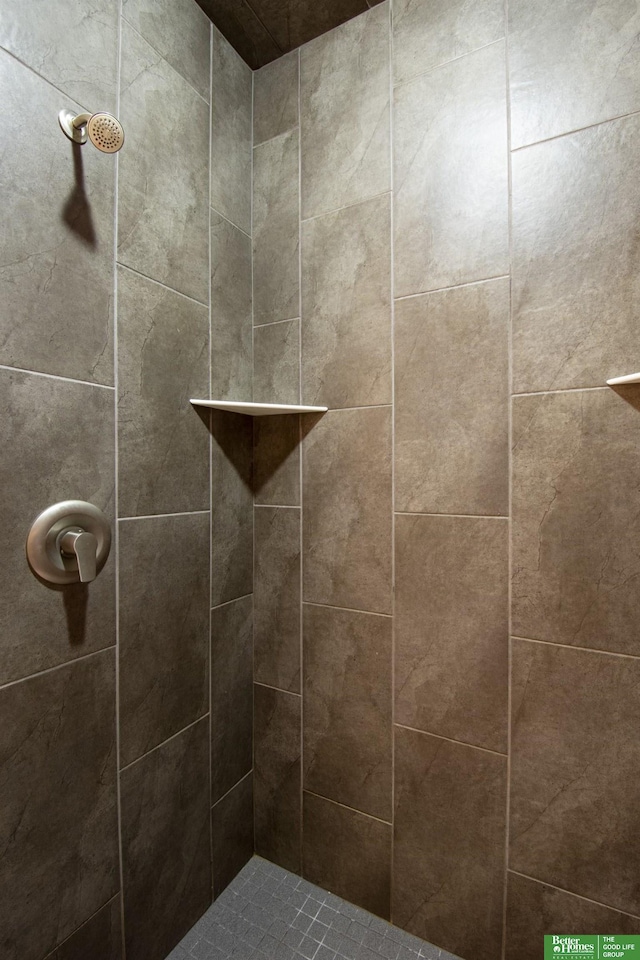 details with a tile shower