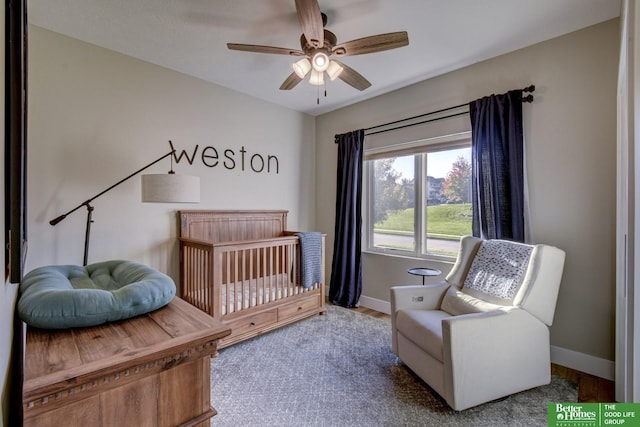 bedroom featuring baseboards and ceiling fan